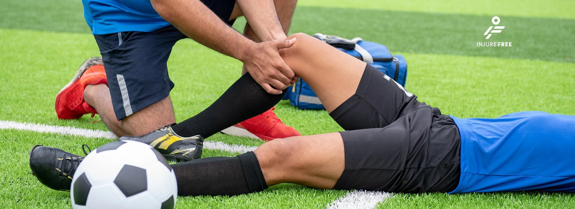 Athletic-trainer-evaluating-injury